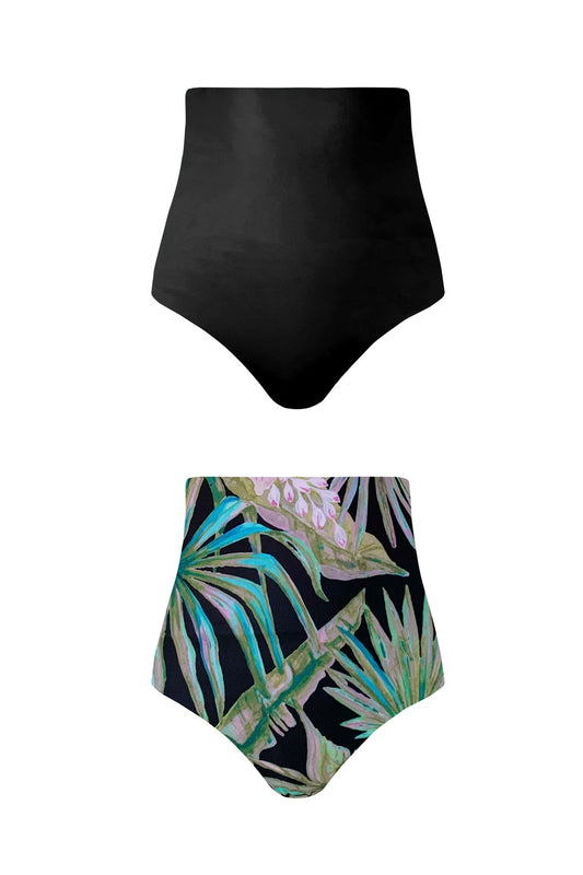 Product image showing each reversible side of the Martinique bikini bottoms. One side is black, and the other features a hand-painted tropical botanic print with pops of pink and green on a black base.