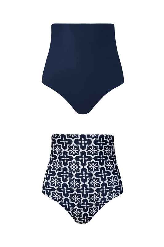 Product image showing each reversible side of the Riad bikini bottoms. One side shows the block midnight navy colour, the other features a striking geometric tile print.