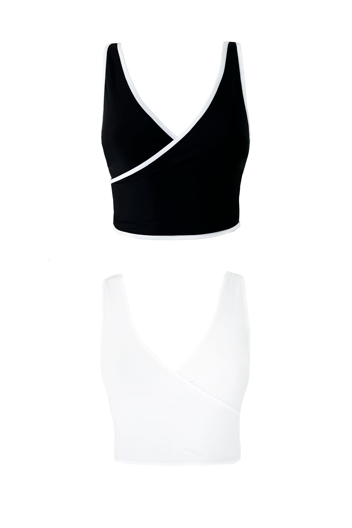 Product image showing the Coco bikini top. One side is solid white while the other is all black with white binding.