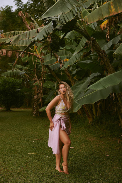 Midi sarong worn by woman in garden